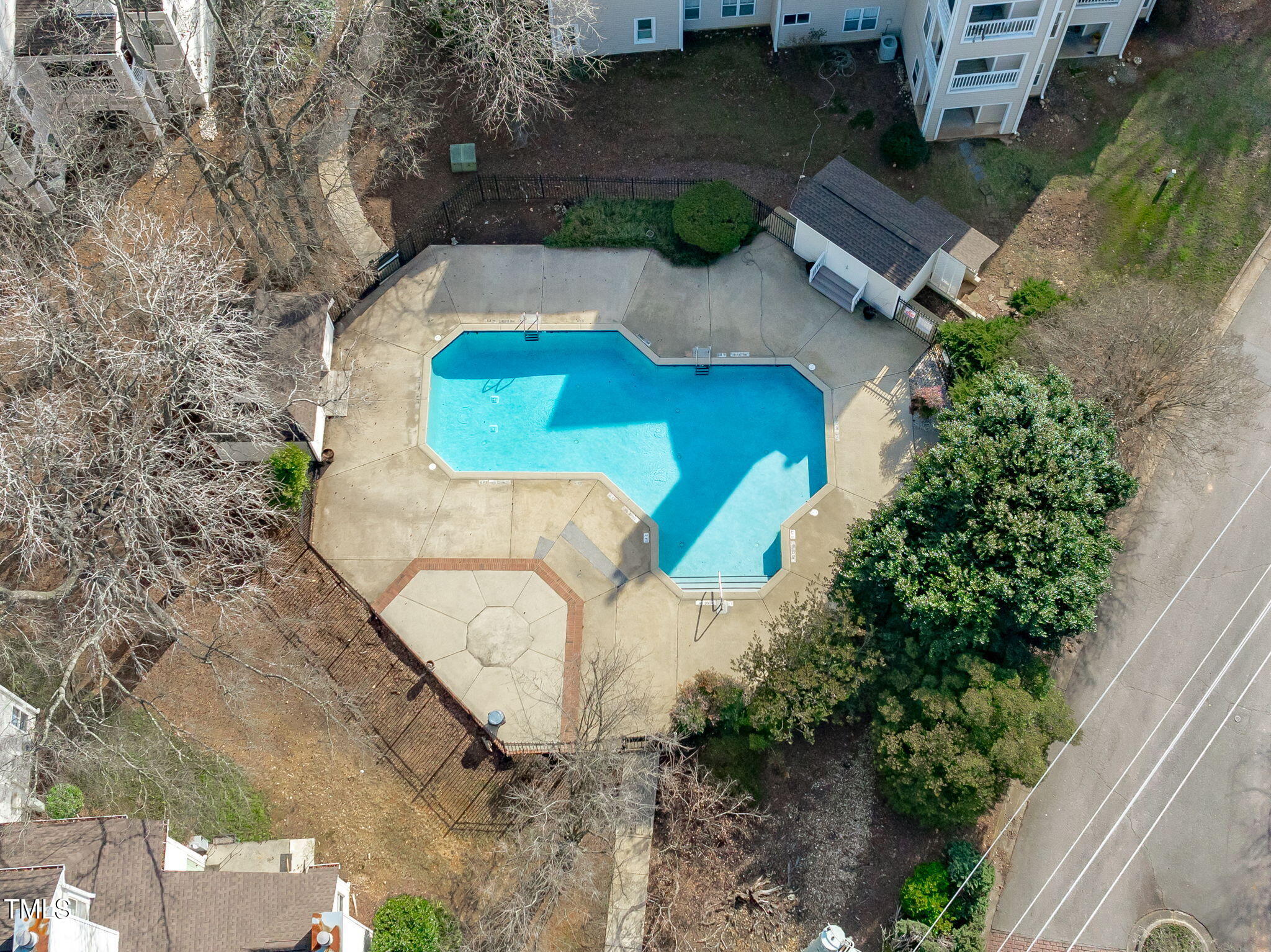 6131 Summer Pointe Place, Unit 101 Raleigh, NC 27606 - Photo 20 of 21 an aerial view of a house with outdoor space