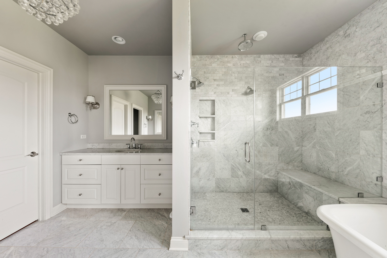 26070 West Sunset Road Barrington, IL 60010 - Photo 13 of 30 a bathroom with a granite countertop sink a mirror and a bathtub