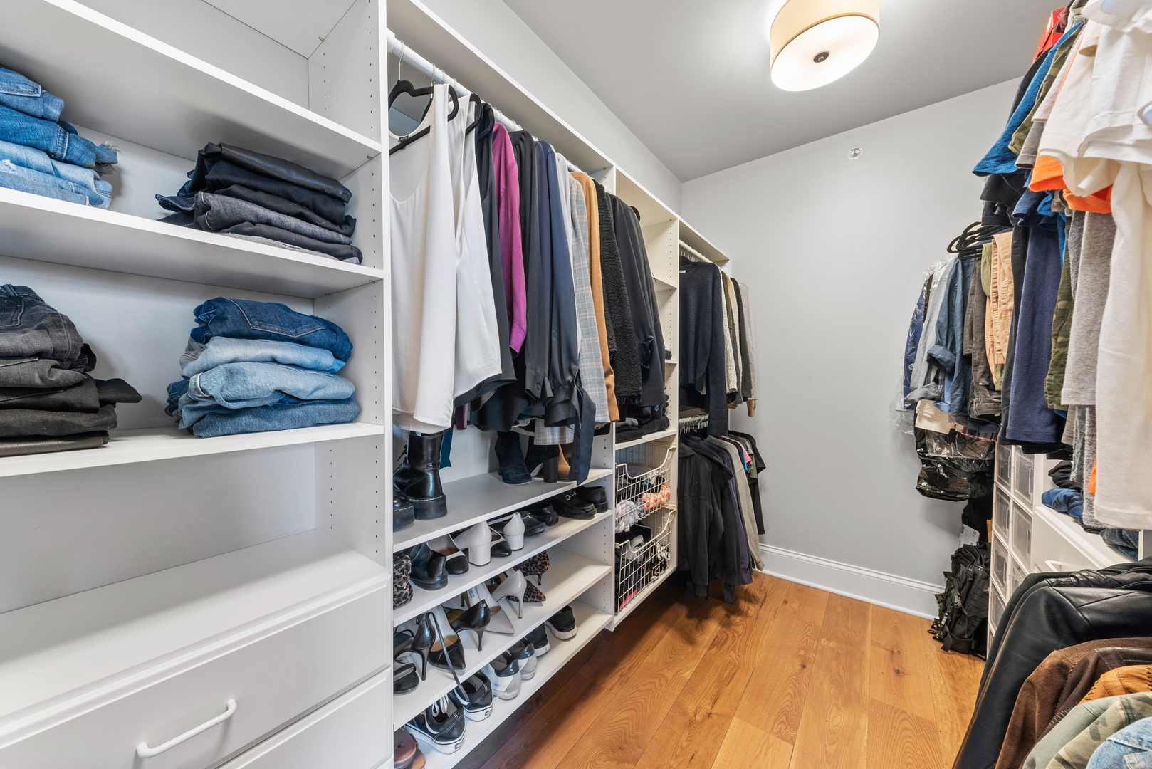 26070 West Sunset Road Barrington, IL 60010 - Photo 14 of 30 a view of walk in closet with clothes and shoes