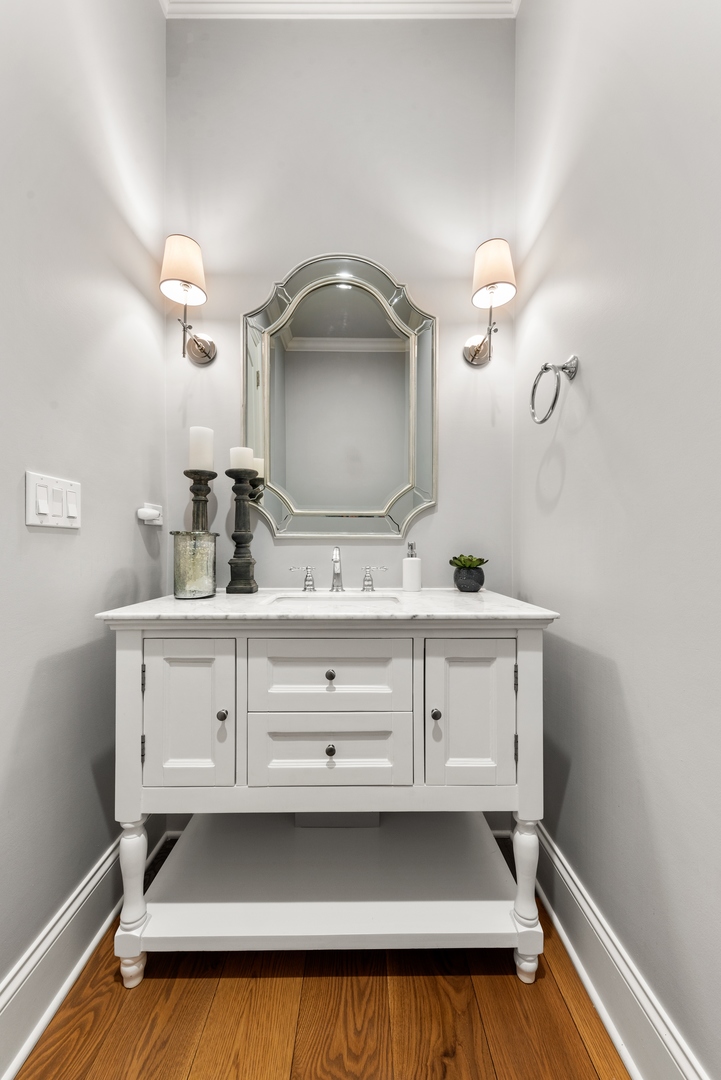 26070 West Sunset Road Barrington, IL 60010 - Photo 24 of 30 a bathroom with a sink double vanity and mirror
