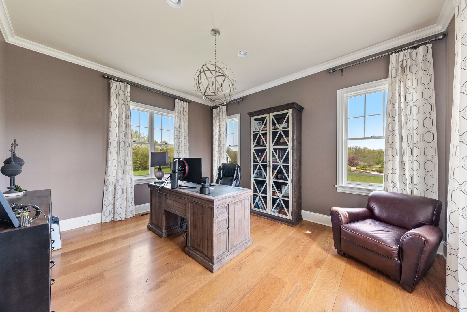 26070 West Sunset Road Barrington, IL 60010 - Photo 10 of 30 a living room with furniture and a wooden floor