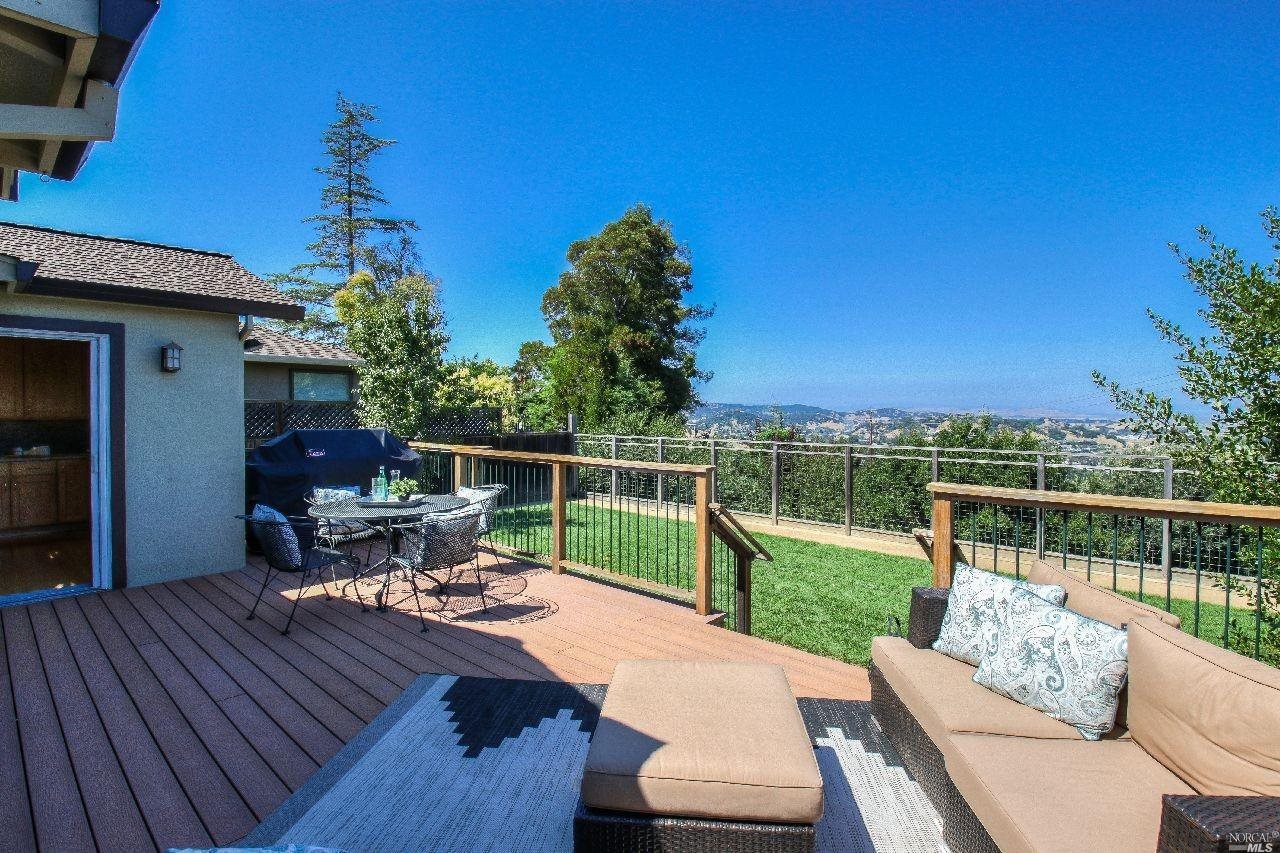 60 Ridgewood Drive San Rafael, CA 94901 - Photo 1 of 1 a view of a patio with couches chairs and a table