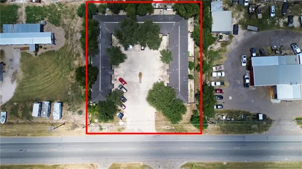 an aerial view of houses and roads