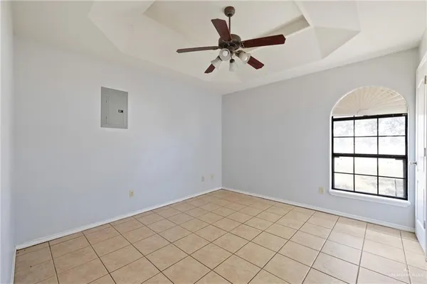 a view of an empty room and window