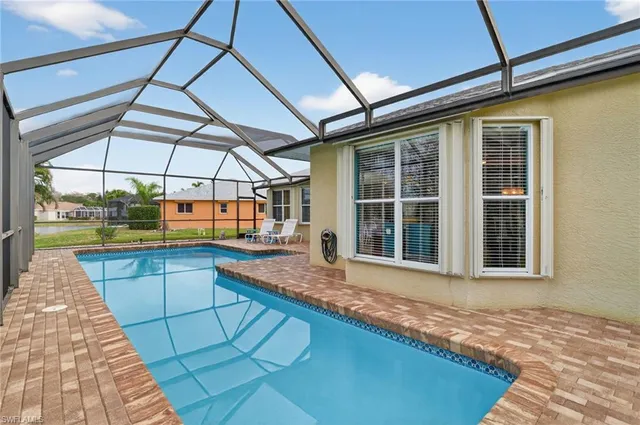 a view of a backyard of a house