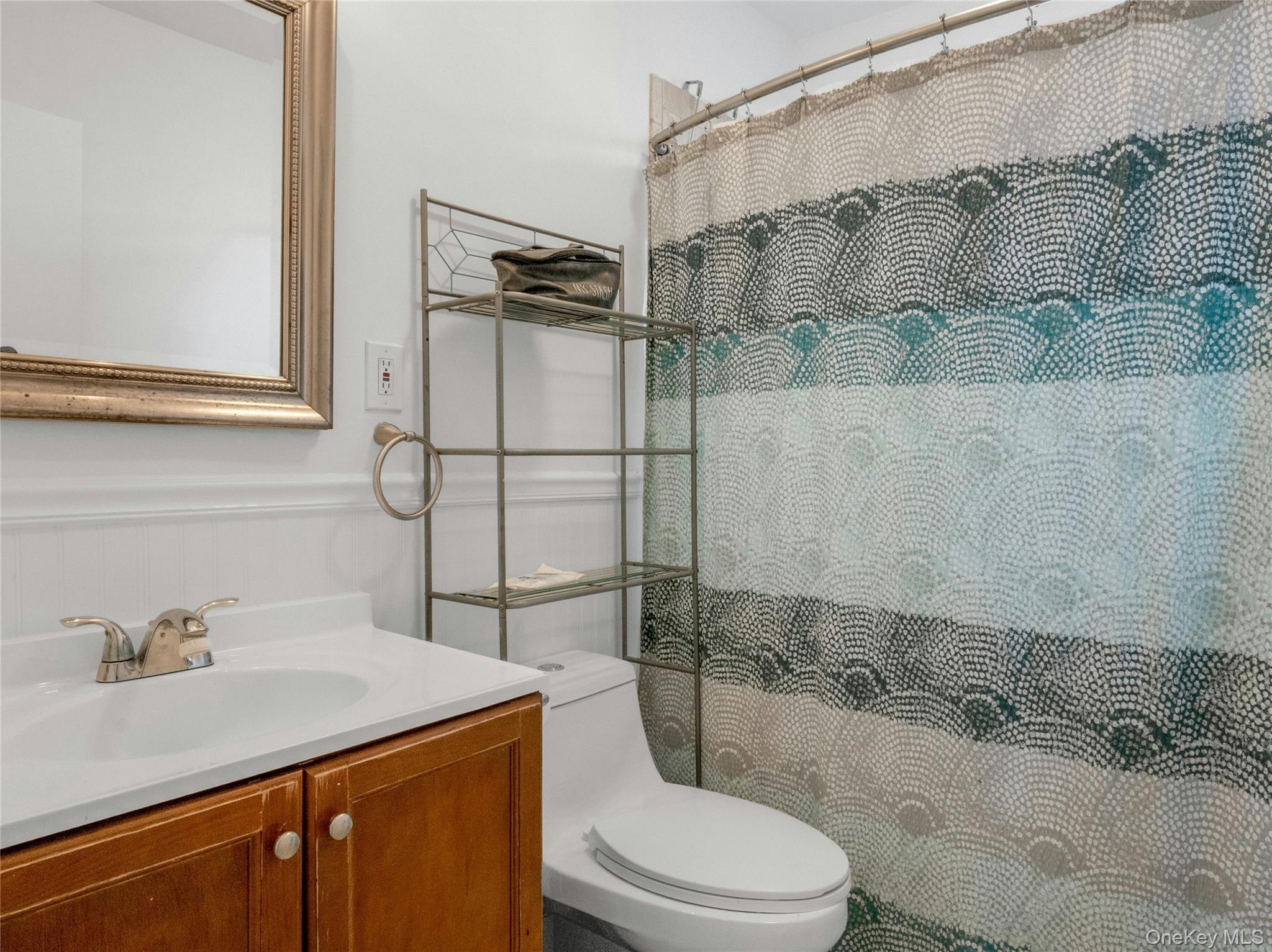 46 Meadow Lane New Rochelle, NY 10805 - Photo 24 of 42 a bathroom with a sink toilet and shower