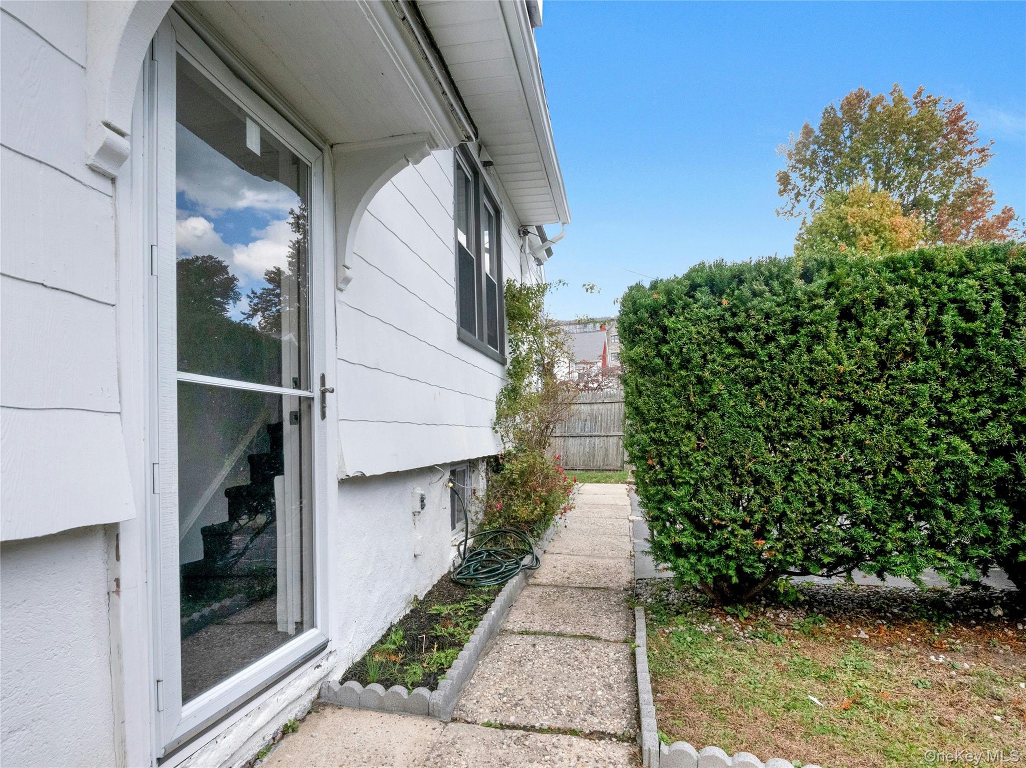 46 Meadow Lane New Rochelle, NY 10805 - Photo 33 of 42 a path view of a house with a yard