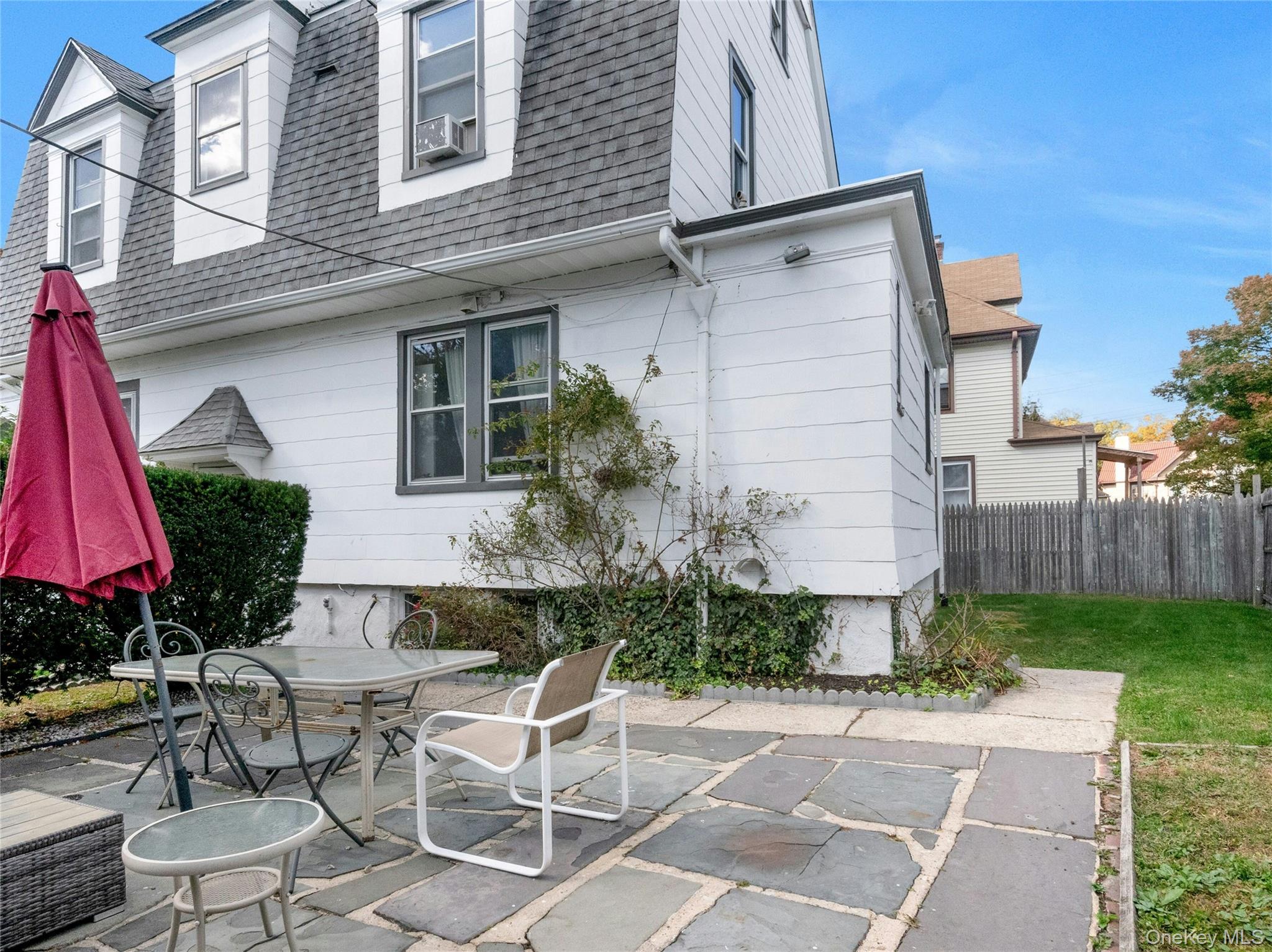 46 Meadow Lane New Rochelle, NY 10805 - Photo 35 of 42 a view of house with backyard and furniture