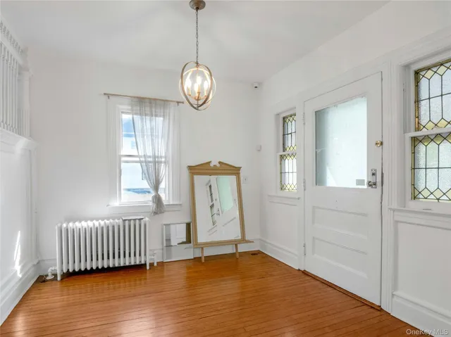 a view of livingroom with furniture and wooden floor