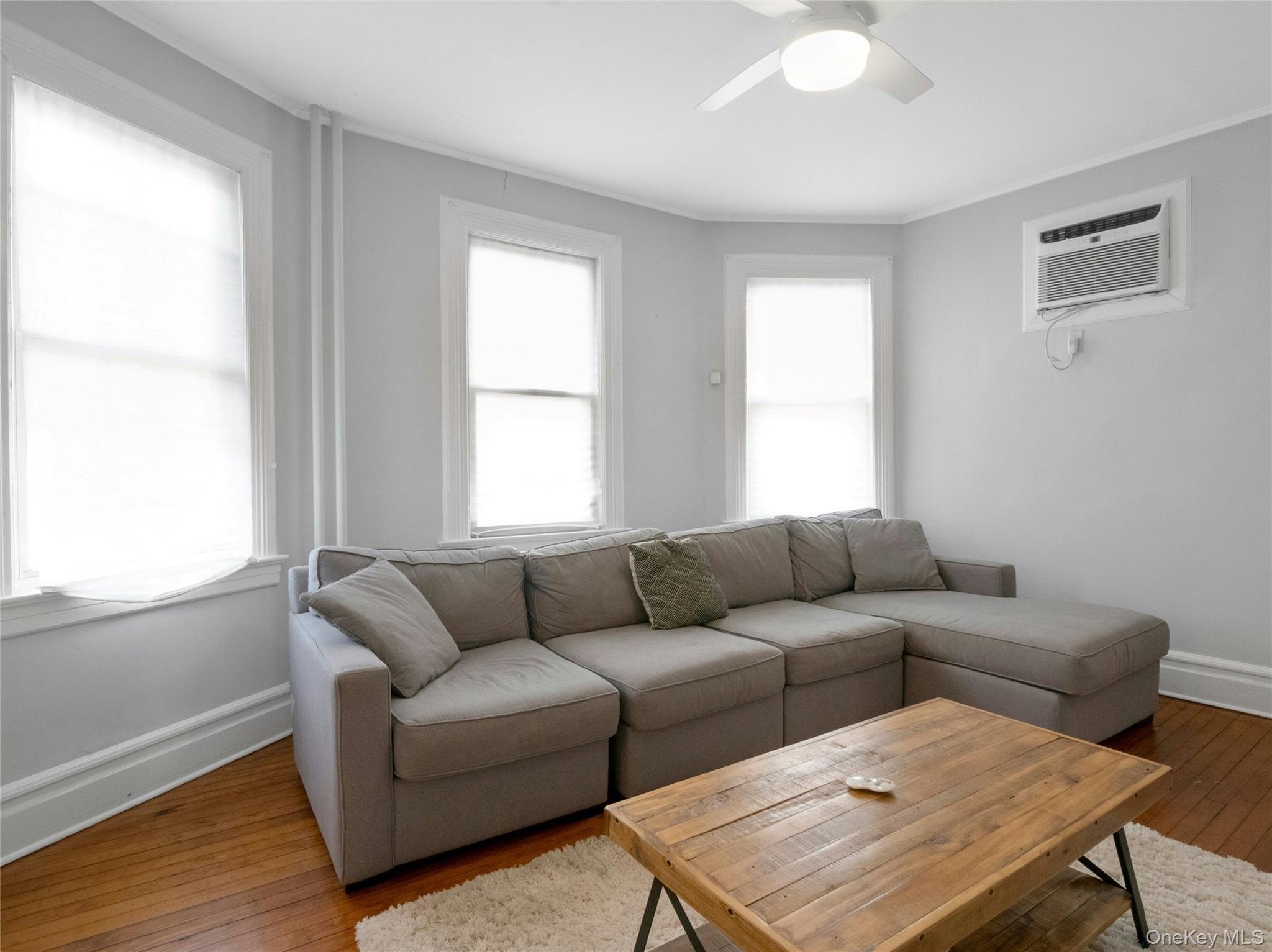46 Meadow Lane New Rochelle, NY 10805 - Photo 6 of 42 a living room with furniture and a window