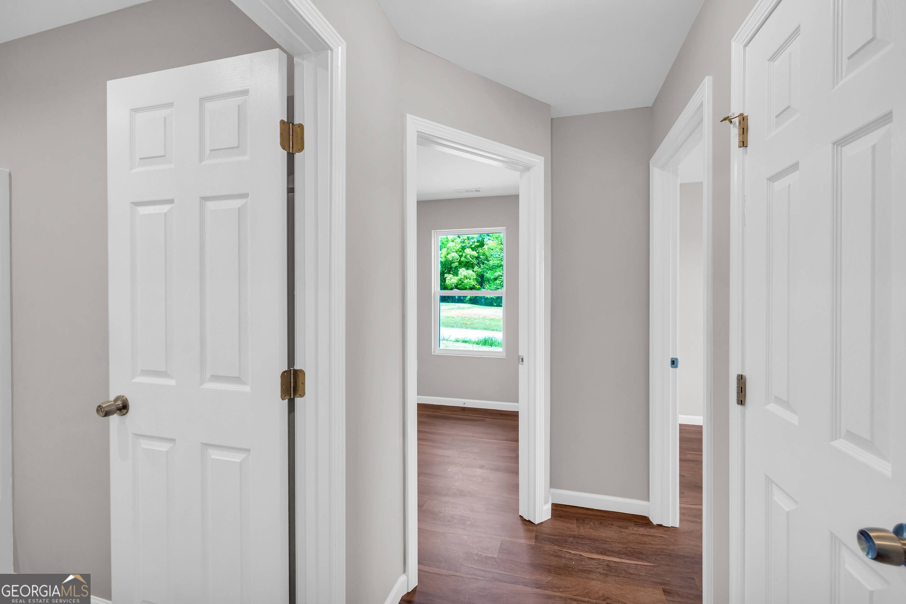 143 ADALINE Court Carnesville, GA 30521 - Photo 4 of 19 a view of a hallway with wooden floor