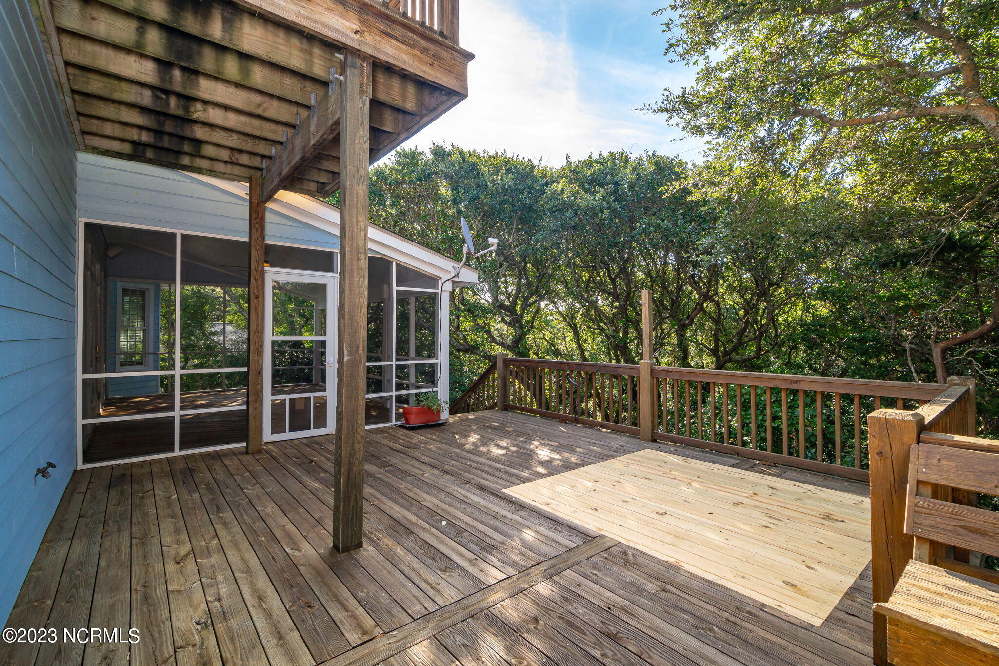 575 Coral Ridge Road Pine Knoll Shores, NC 28512 - Photo 18 of 73 Open deck on back of home