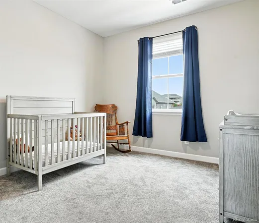 a view of an empty room with windows