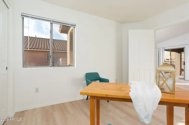 a workspace with furniture and a window