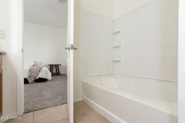 a bathroom with a bathtub