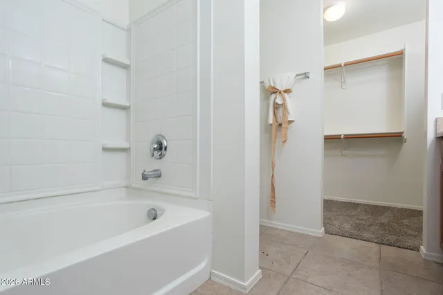 a view of a livingroom with a dinning area hardwood and a kitchen