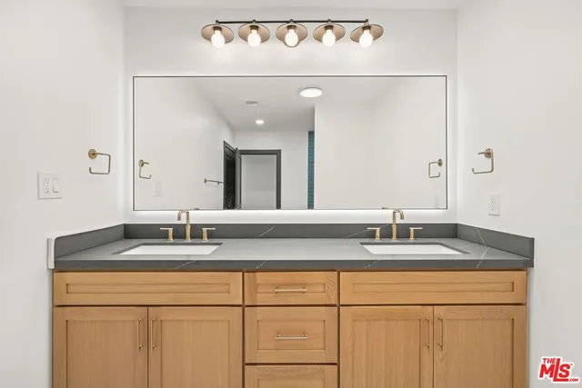 a bathroom with a tub and a shower