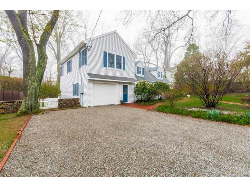 4 Memory Lane Rowayton, CT 06853 - Photo 2 of 25 a view of a house with a yard and garage