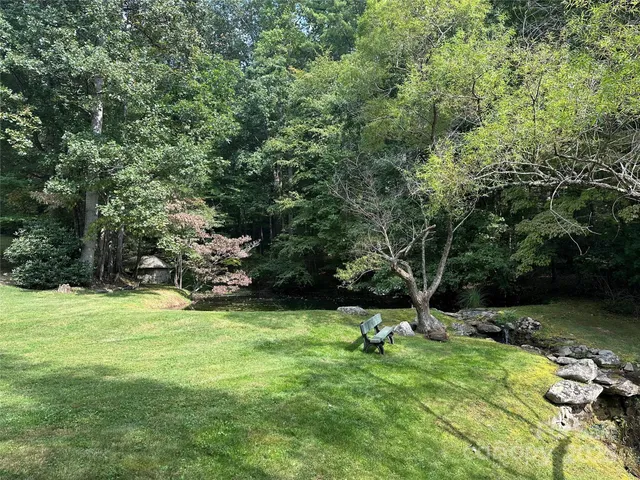 a view of a golf course with a lake