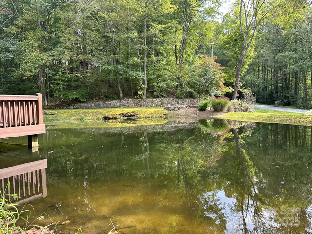 a view of a golf course with an outdoor space