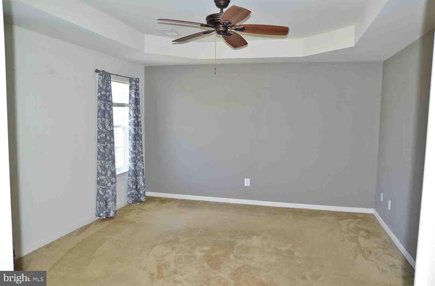 167 Bouldin Road Charles Town, WV 25414 - Photo 11 of 30 an empty room with closet and windows