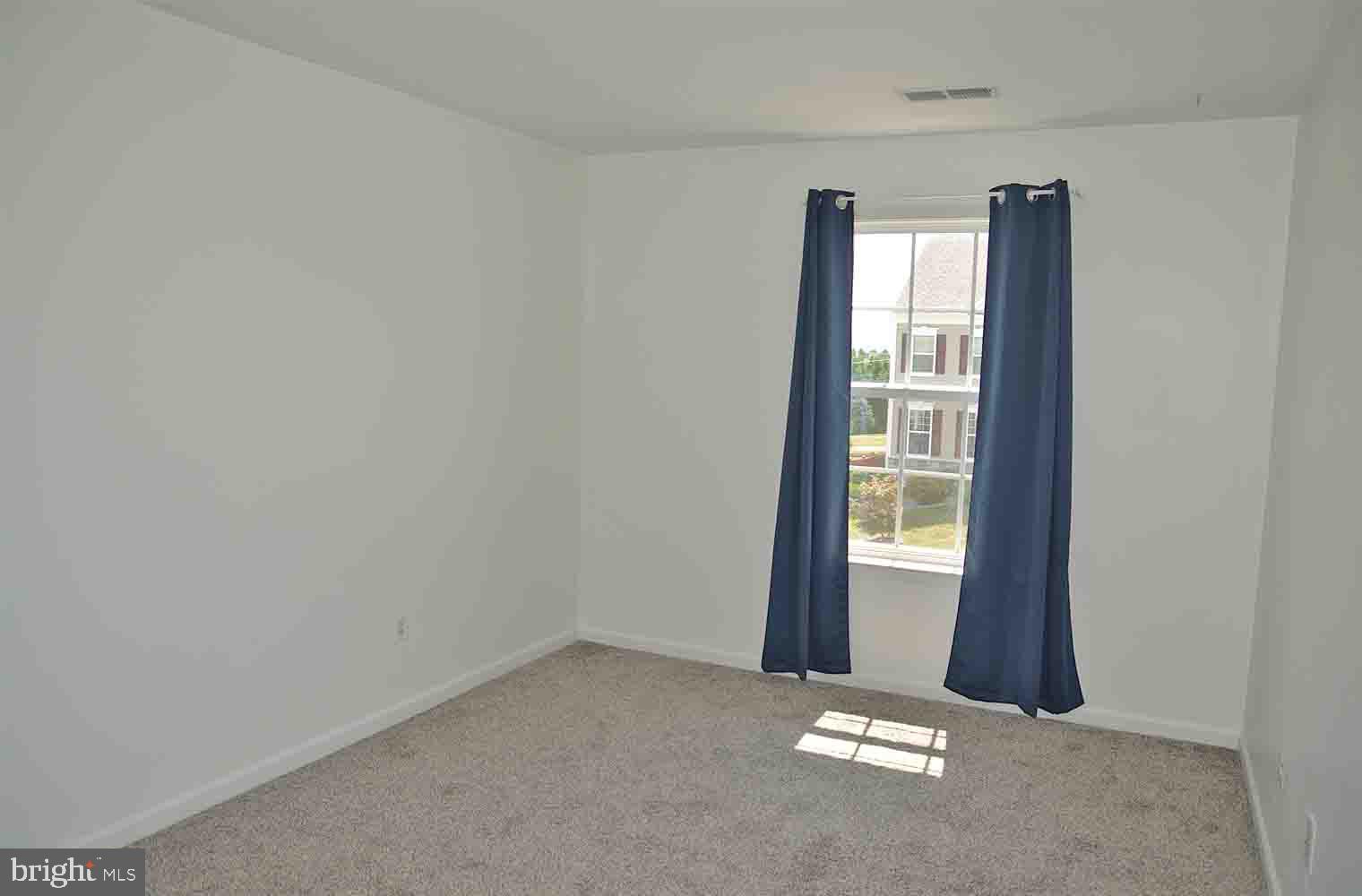 167 Bouldin Road Charles Town, WV 25414 - Photo 16 of 30 an empty room with windows