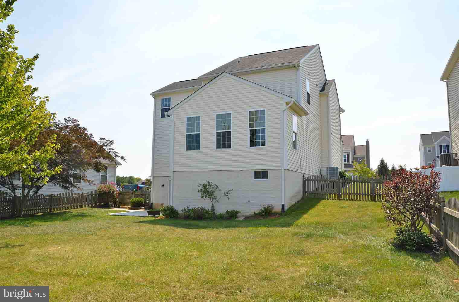 167 Bouldin Road Charles Town, WV 25414 - Photo 28 of 30 a view of a house with pool and a garden