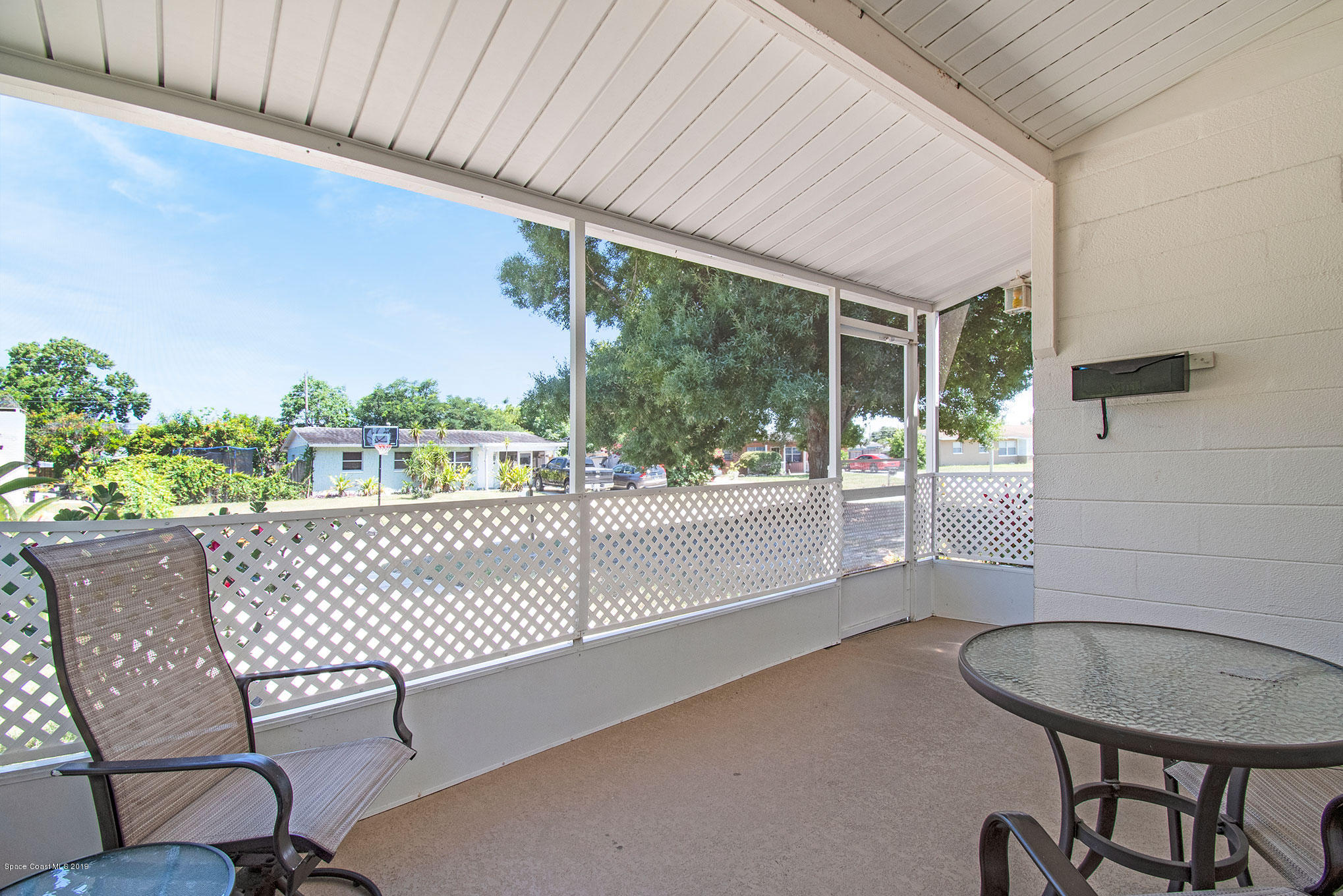 2238 King Richard Road Melbourne, FL 32935 - Photo 2 of 20 Screened porch