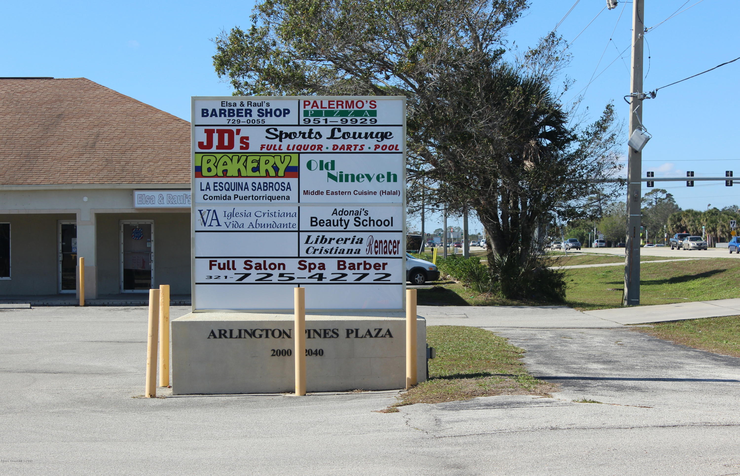 2020 Palm Bay Road Northeast, Unit 6 Palm Bay, FL 32905 - Photo 2 of 10 a view of a street sign of a house