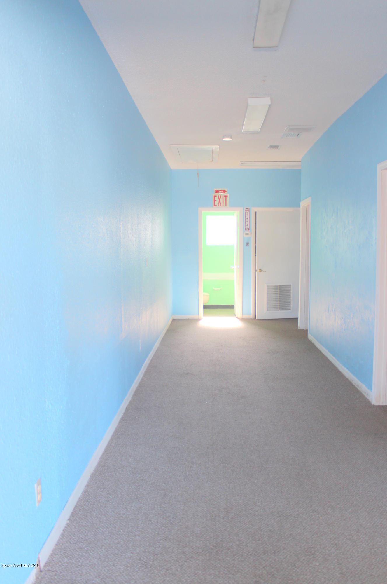 2020 Palm Bay Road Northeast, Unit 6 Palm Bay, FL 32905 - Photo 3 of 10 a view of an empty room with a window
