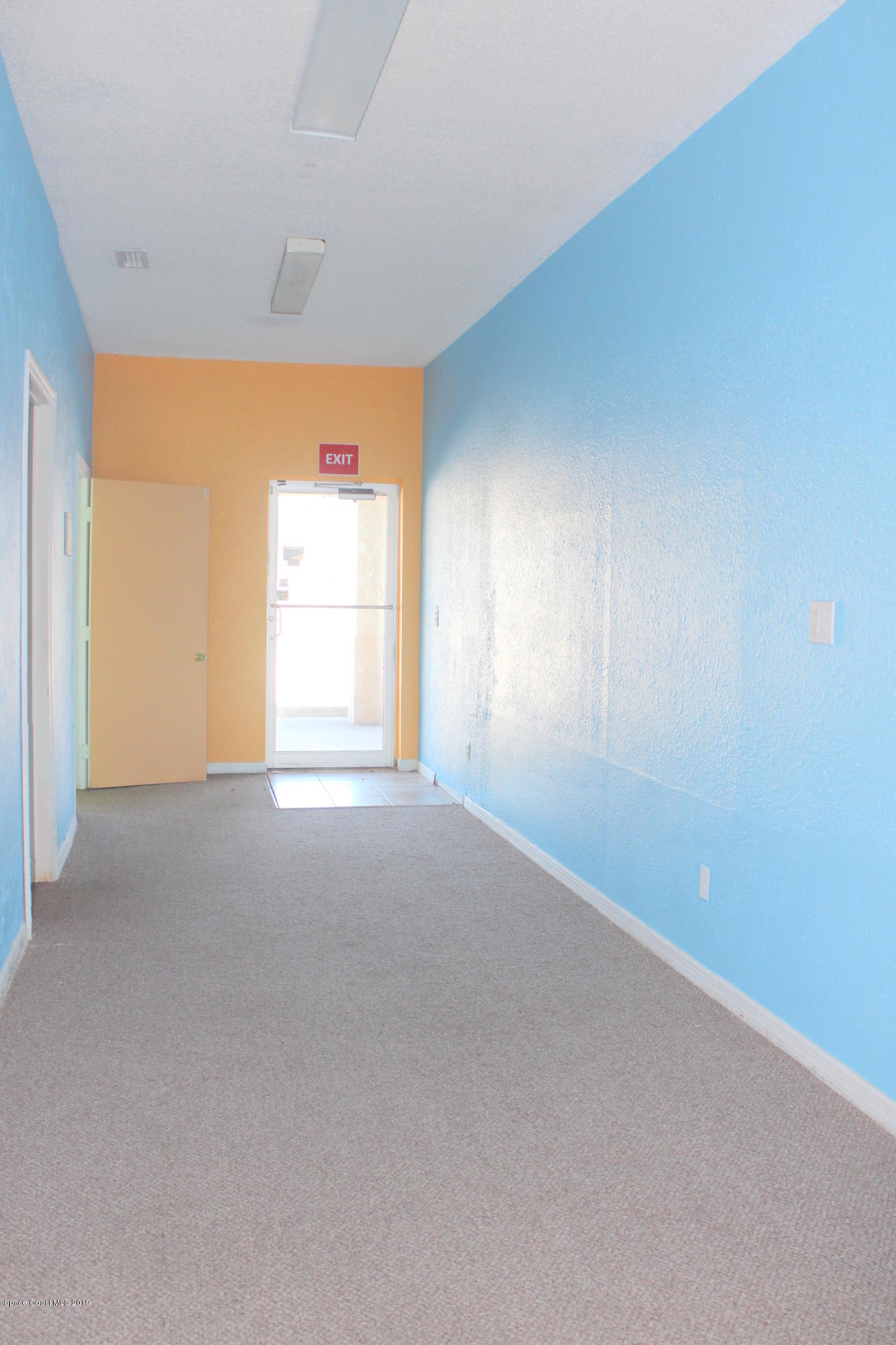 2020 Palm Bay Road Northeast, Unit 6 Palm Bay, FL 32905 - Photo 6 of 10 a view of empty room with window