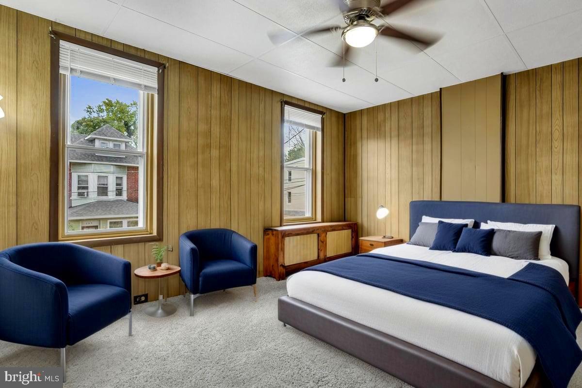 208 8th Street Brookhaven, PA 19015 - Photo 20 of 31 a bedroom with a bed couch and window