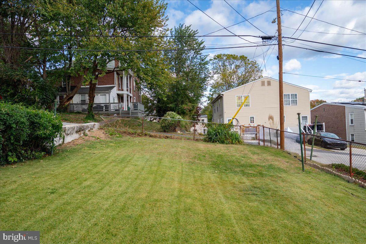 208 8th Street Brookhaven, PA 19015 - Photo 24 of 31 a backyard of a house with table and chairs