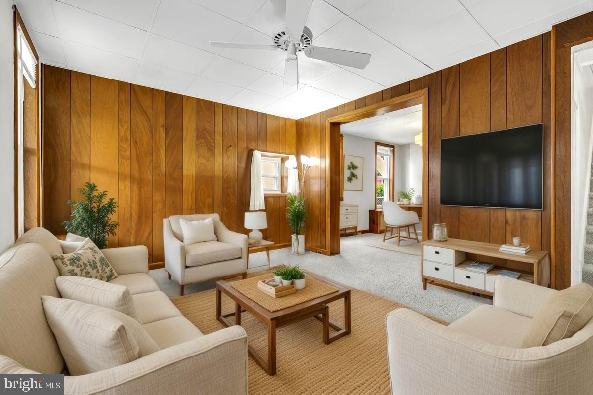 208 8th Street Brookhaven, PA 19015 - Photo 6 of 31 a living room with furniture and a flat screen tv