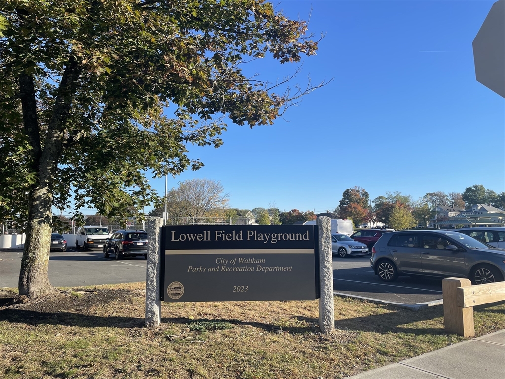 a sign on the side of the road