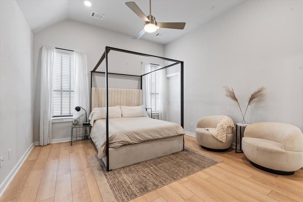 2268 Rook Drive Dallas, TX 75211 - Photo 7 of 13 This room features vaulted ceilings, light wood flooring, and a ceiling fan