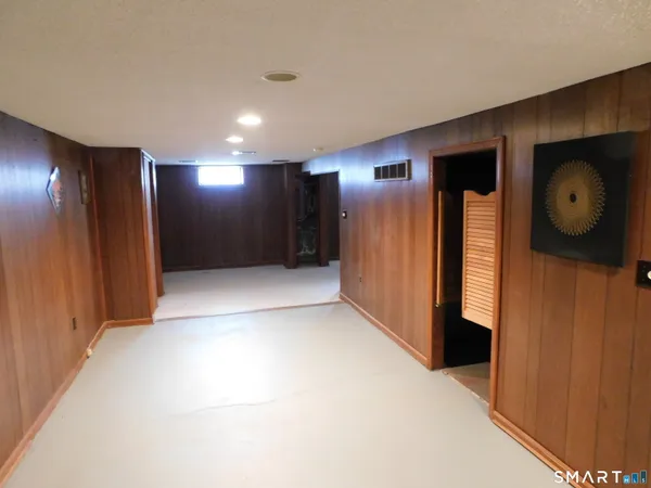 a view of hallway with stairs