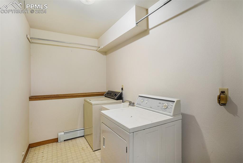 4315 Star Ranch Road Colorado Springs, CO 80906 - Photo 25 of 47 a utility room with dryer and washer