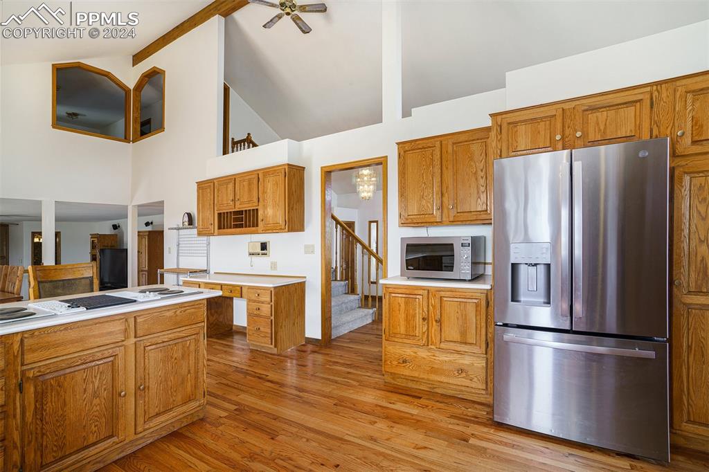 4315 Star Ranch Road Colorado Springs, CO 80906 - Photo 4 of 47 a kitchen with stainless steel appliances a refrigerator stove microwave and cabinets