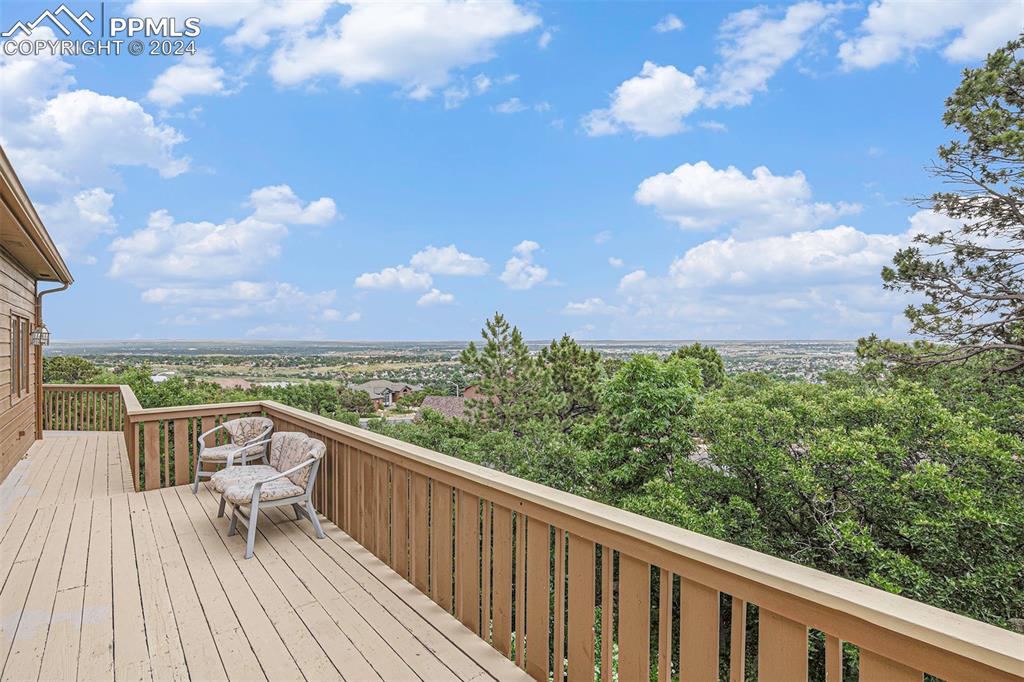 4315 Star Ranch Road Colorado Springs, CO 80906 - Photo 43 of 47 a view of a balcony with wooden floor