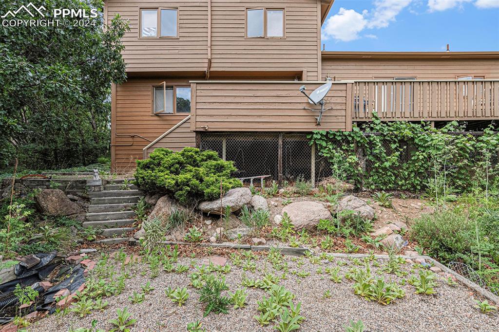 4315 Star Ranch Road Colorado Springs, CO 80906 - Photo 46 of 47 a house with a yard and plants