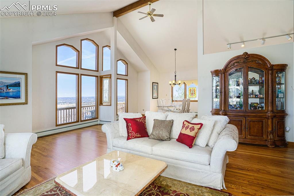 4315 Star Ranch Road Colorado Springs, CO 80906 - Photo 9 of 47 a living room with furniture or couch and a large window