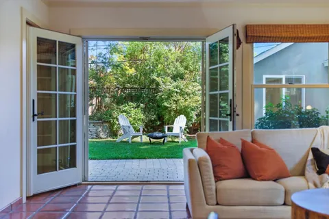 a outdoor living space with furniture and garden view