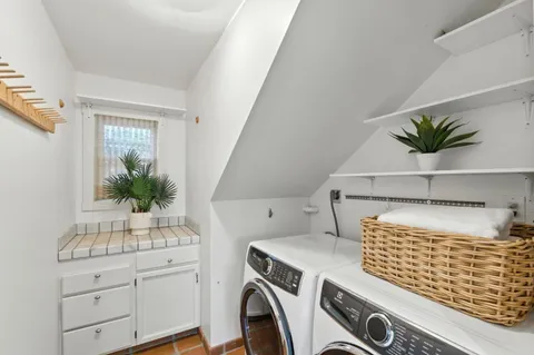 a room with storage and utility room