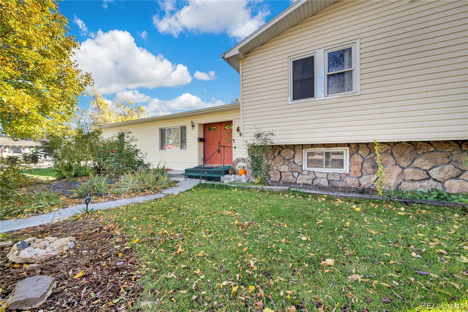 a backyard of a house with seating space