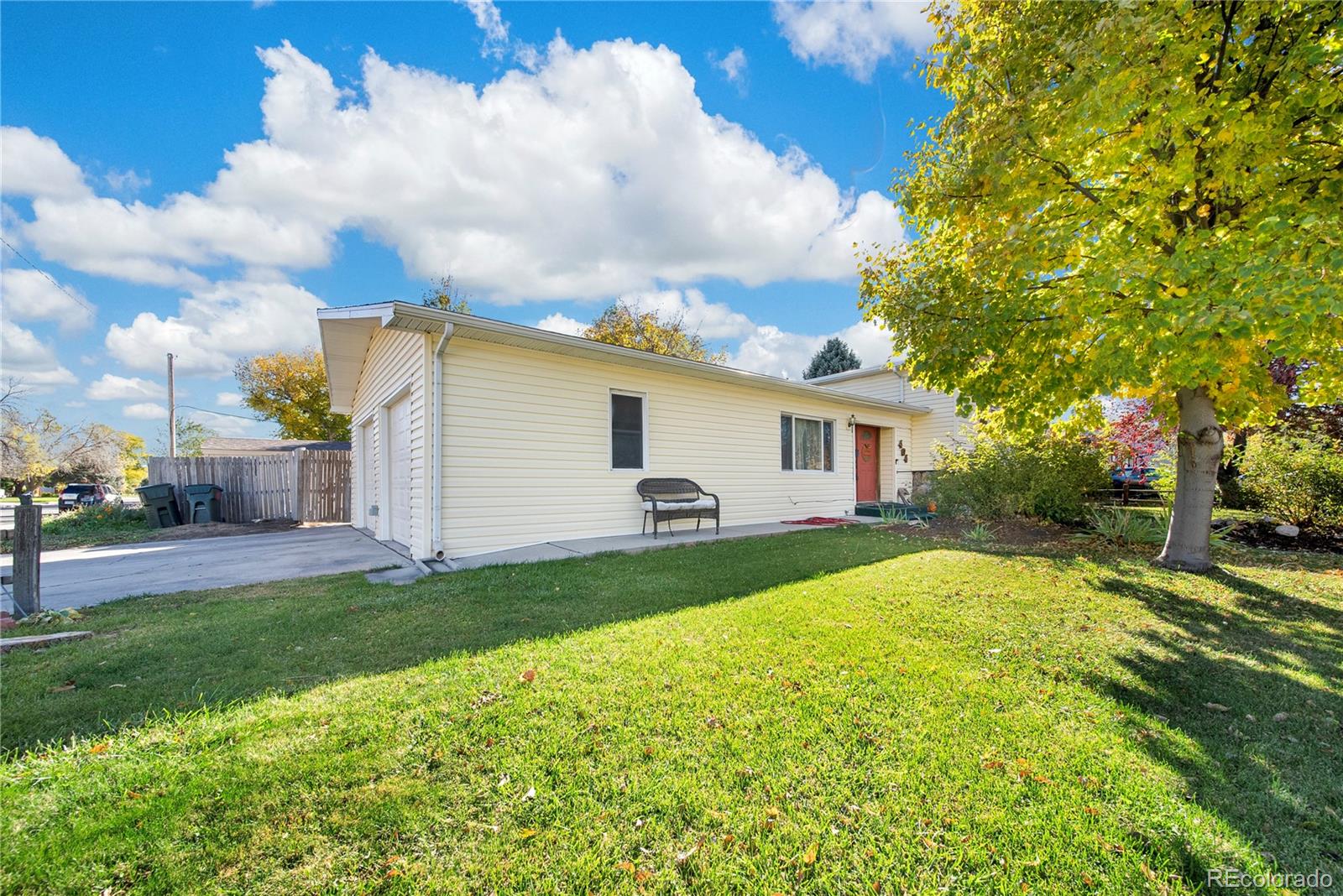 404 Hickory Street Fort Morgan, CO 80701 - Photo 8 of 37 a view of a yard with a house