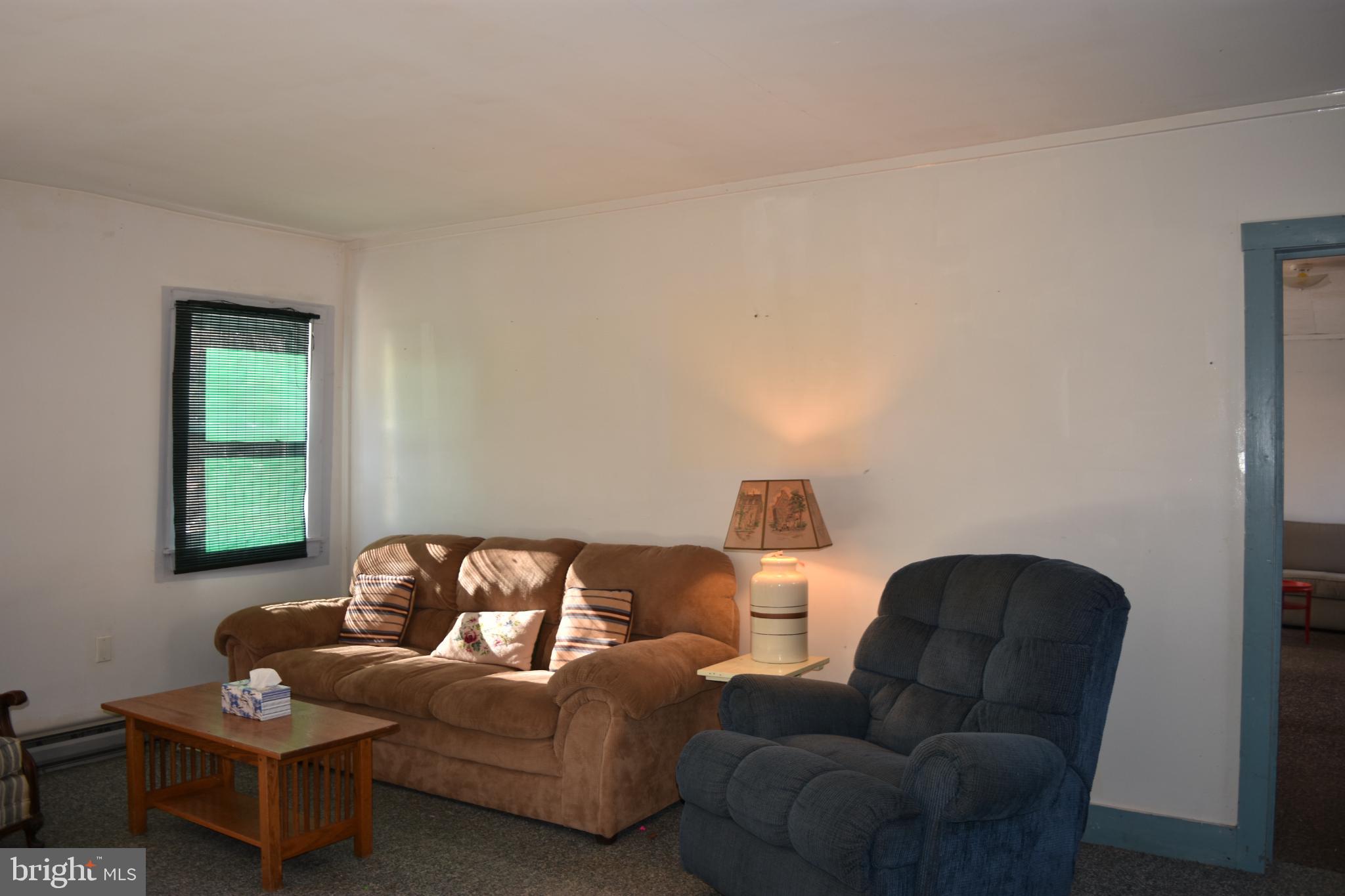 1417 Mountainside Road Berkeley Springs, WV 25411 - Photo 14 of 76 Cozy living space with natural light.