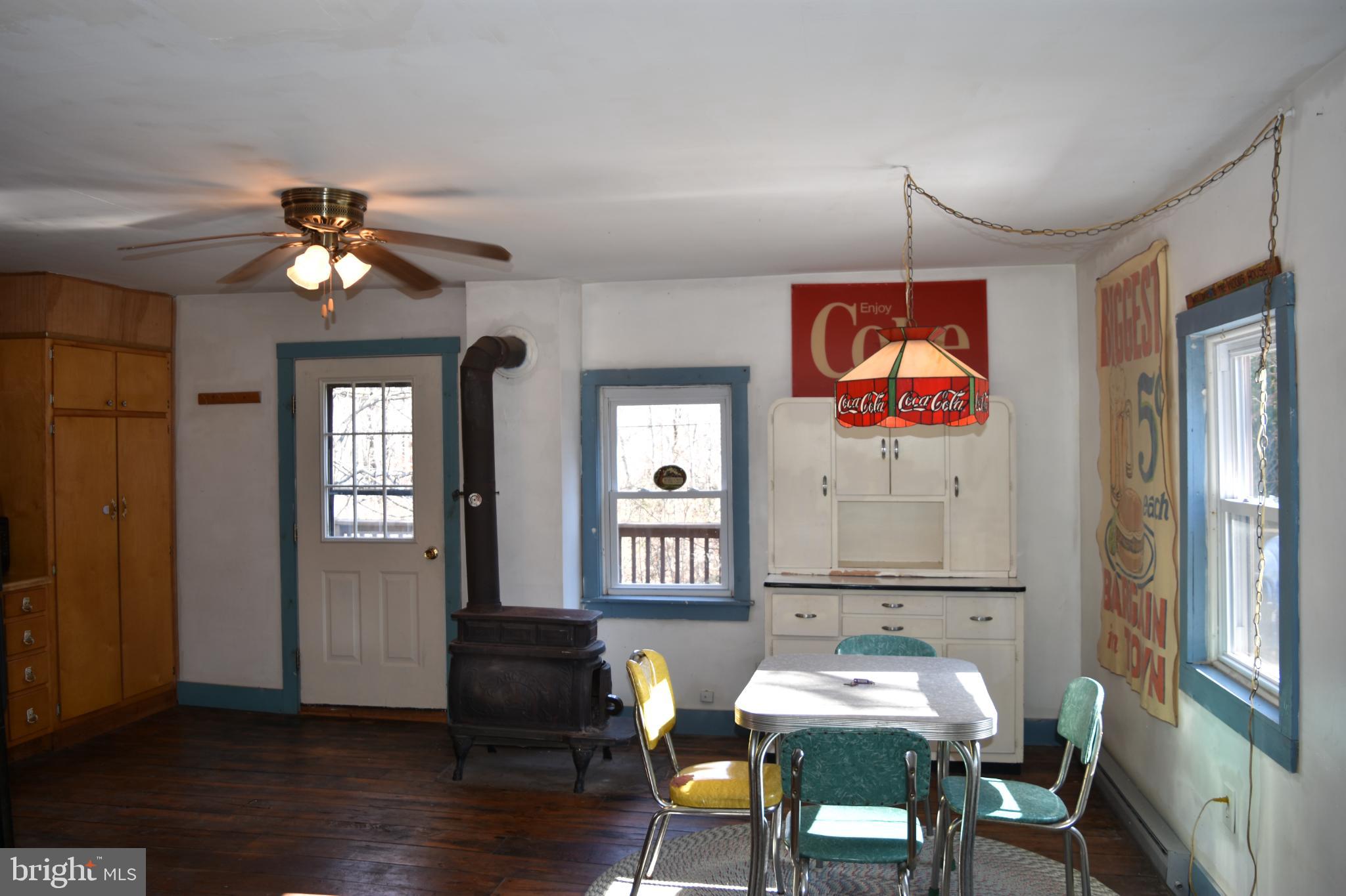 1417 Mountainside Road Berkeley Springs, WV 25411 - Photo 2 of 76 Charming vintage kitchen with rustic appeal.