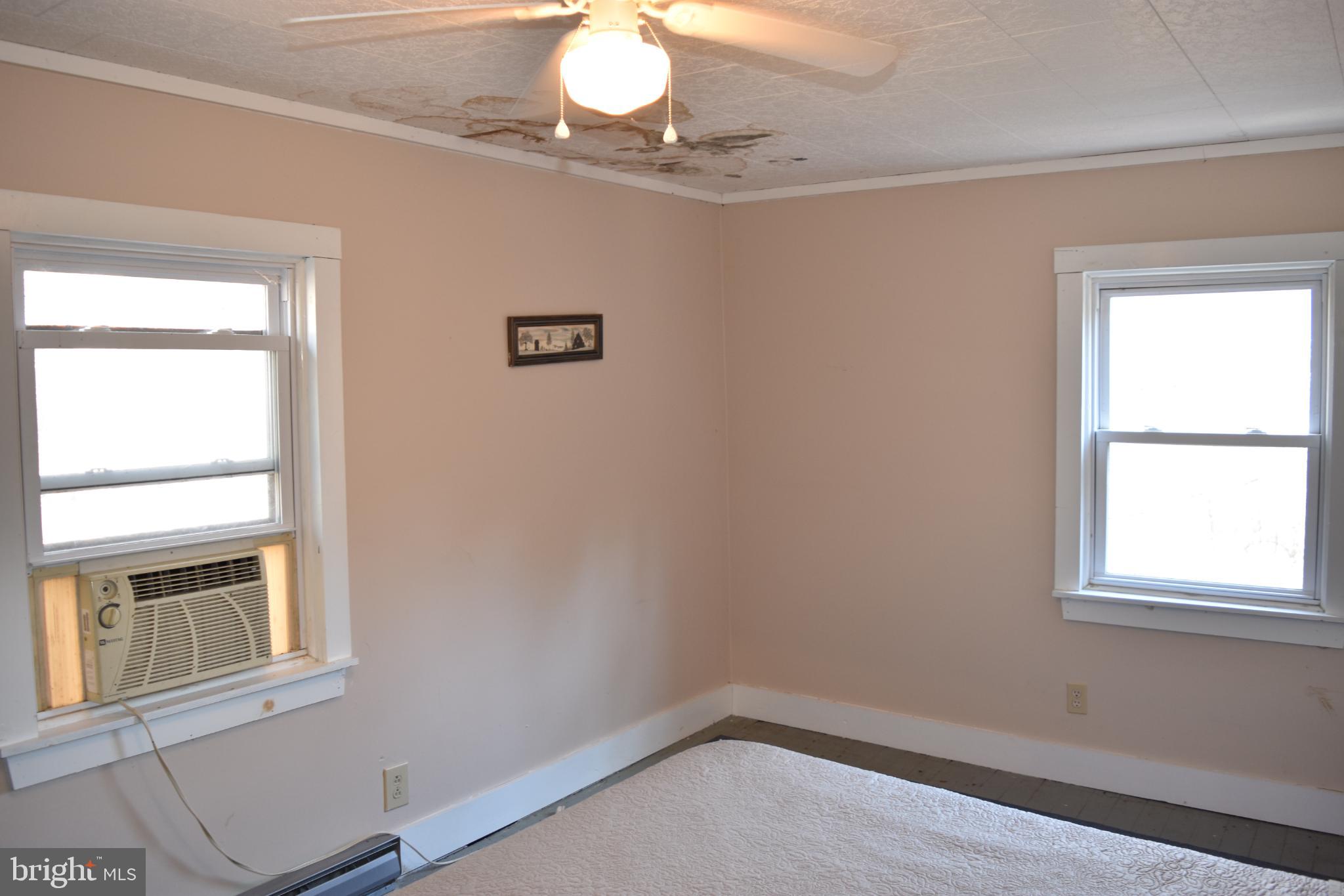 1417 Mountainside Road Berkeley Springs, WV 25411 - Photo 26 of 76 Cozy room with natural light and charm.