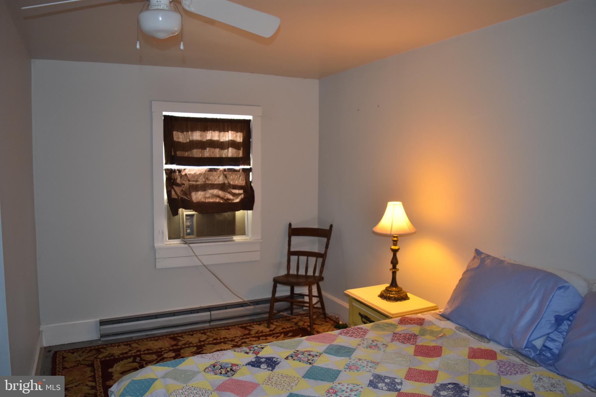 1417 Mountainside Road Berkeley Springs, WV 25411 - Photo 41 of 76 Cozy retreat with warm lighting and charm.